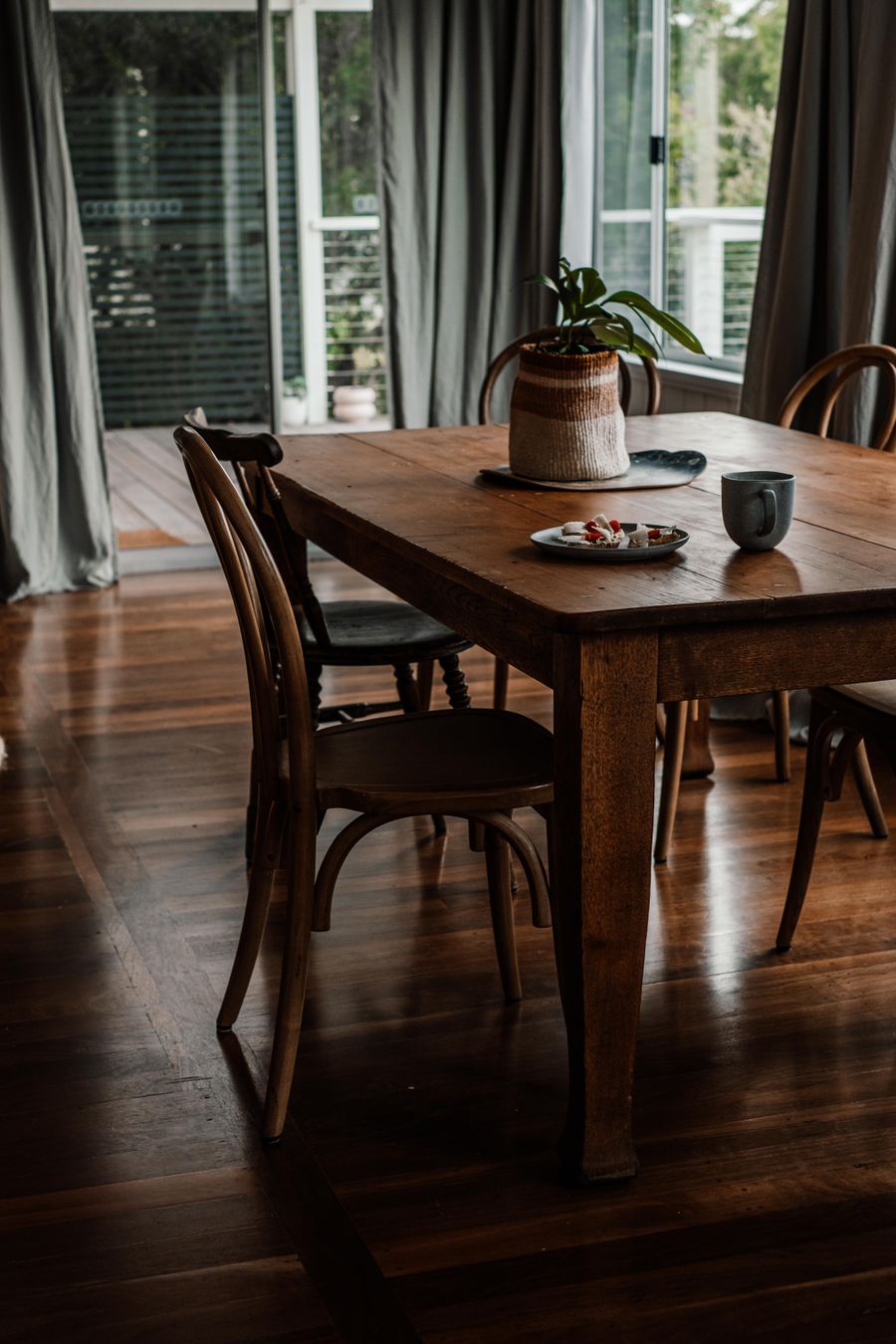 Wooden dining table with chairs